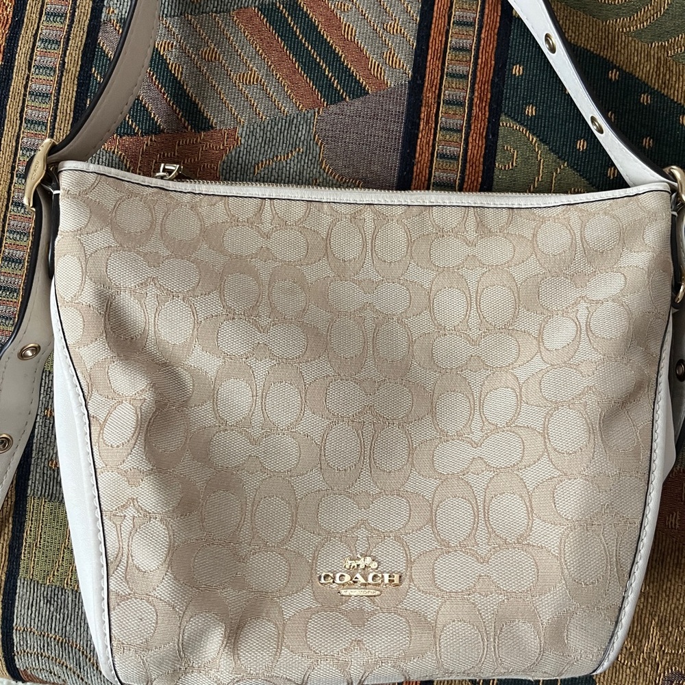 Coach signature crossbody canvas and leather tan - great condition! $200